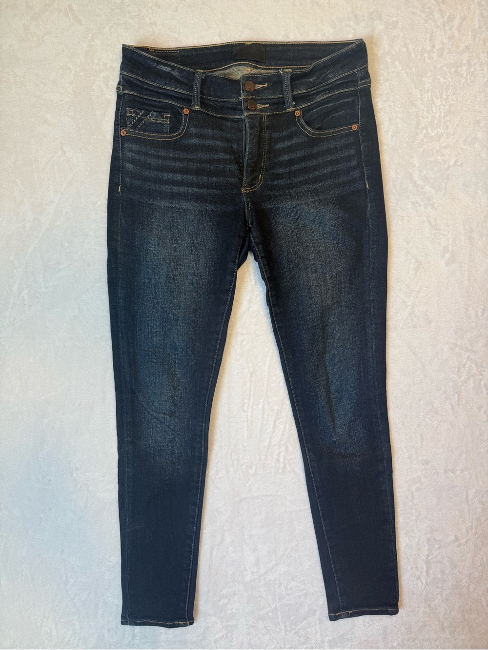 Buckle Indigo Skinny Jeans